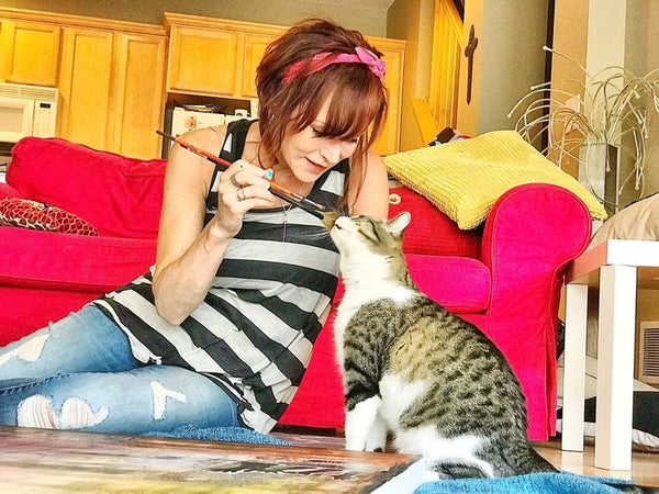 Every artist needs help from her cats